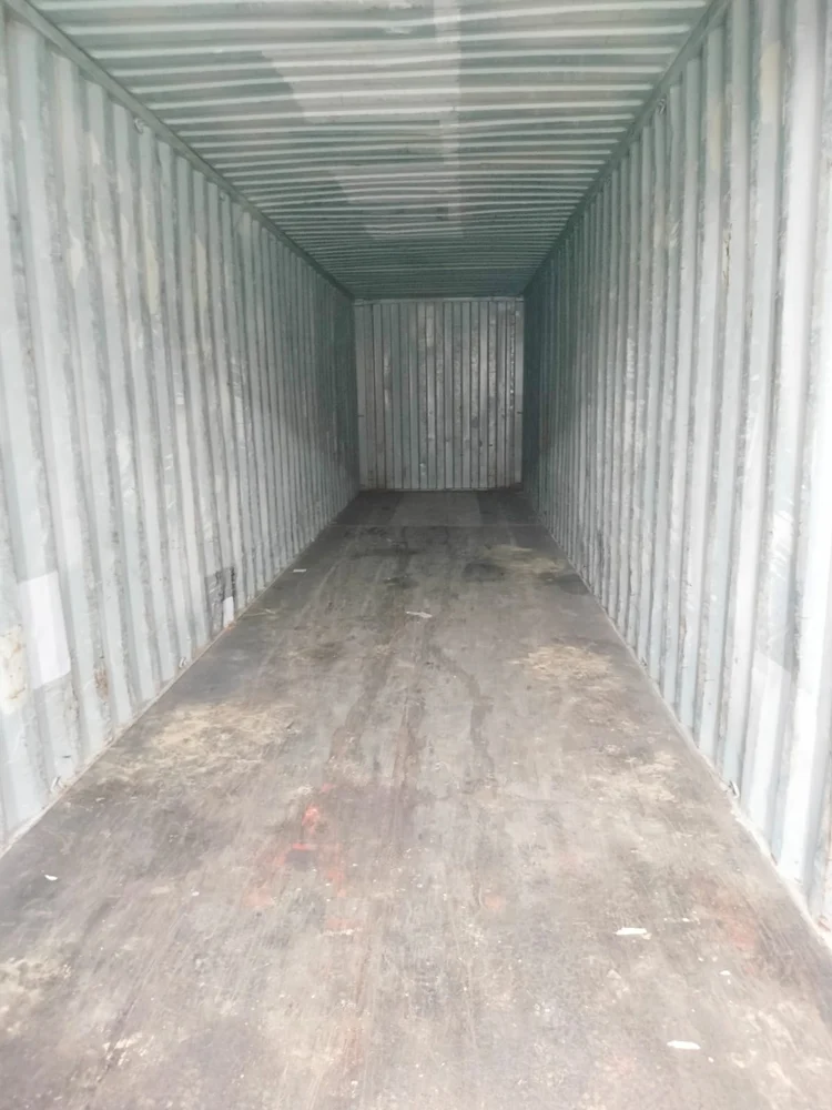 A sizable 40 feet industrial cargo container with a wide door and ample opening, facilitating convenient entry and storage capabilities - office and dry containers