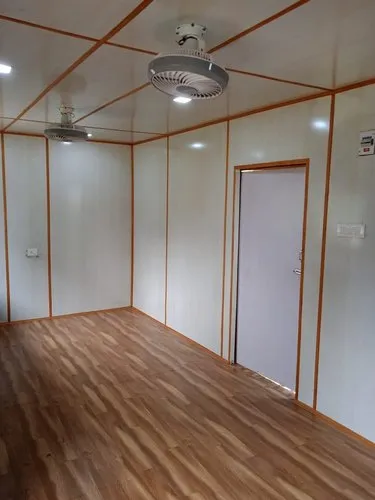 An interior space in portable office containers showcasing elegant wood flooring complemented by pristine white walls, exuding a modern aesthetic - office and dry containers